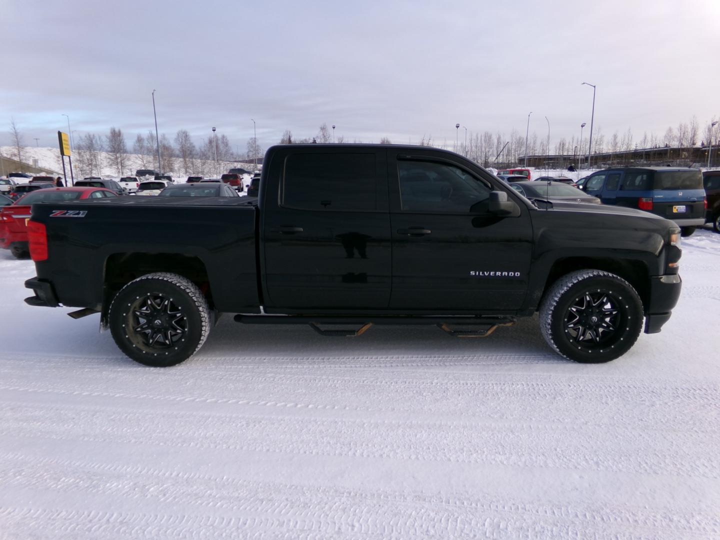 2016 Black Chevrolet Silverado 1500 LT Crew Cab 4WD Z71 (3GCUKREC4GG) with an 5.3L V8 OHV 16V engine, 6A transmission, located at 2630 Philips Field Rd., Fairbanks, AK, 99709, (907) 458-0593, 64.848068, -147.780609 - Photo#2